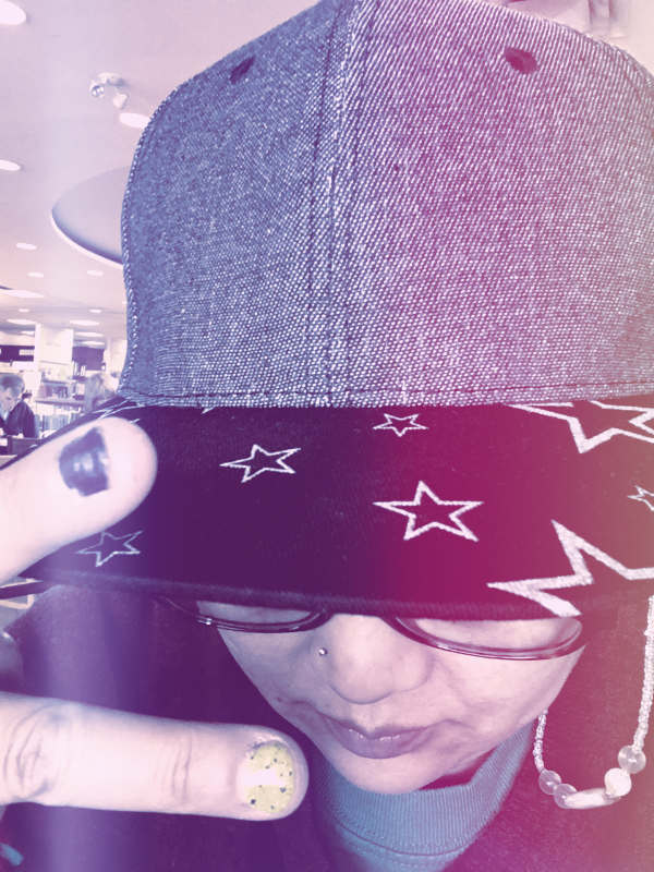 Judy Woo says peace sign with her fingers: #hiphopdontstop